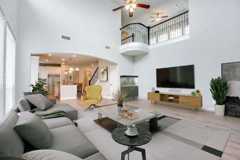 a living room with a couch and a television